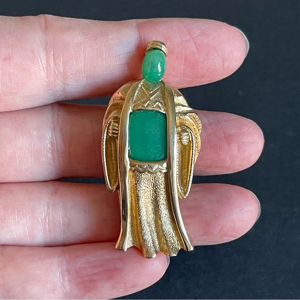 Vintage Marvella Asian Holy Men faux green jade brooch.